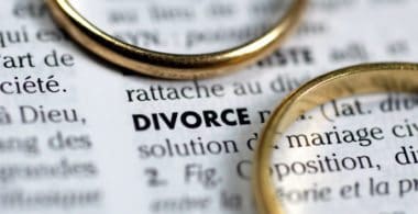 Two rings on a page that says divorce