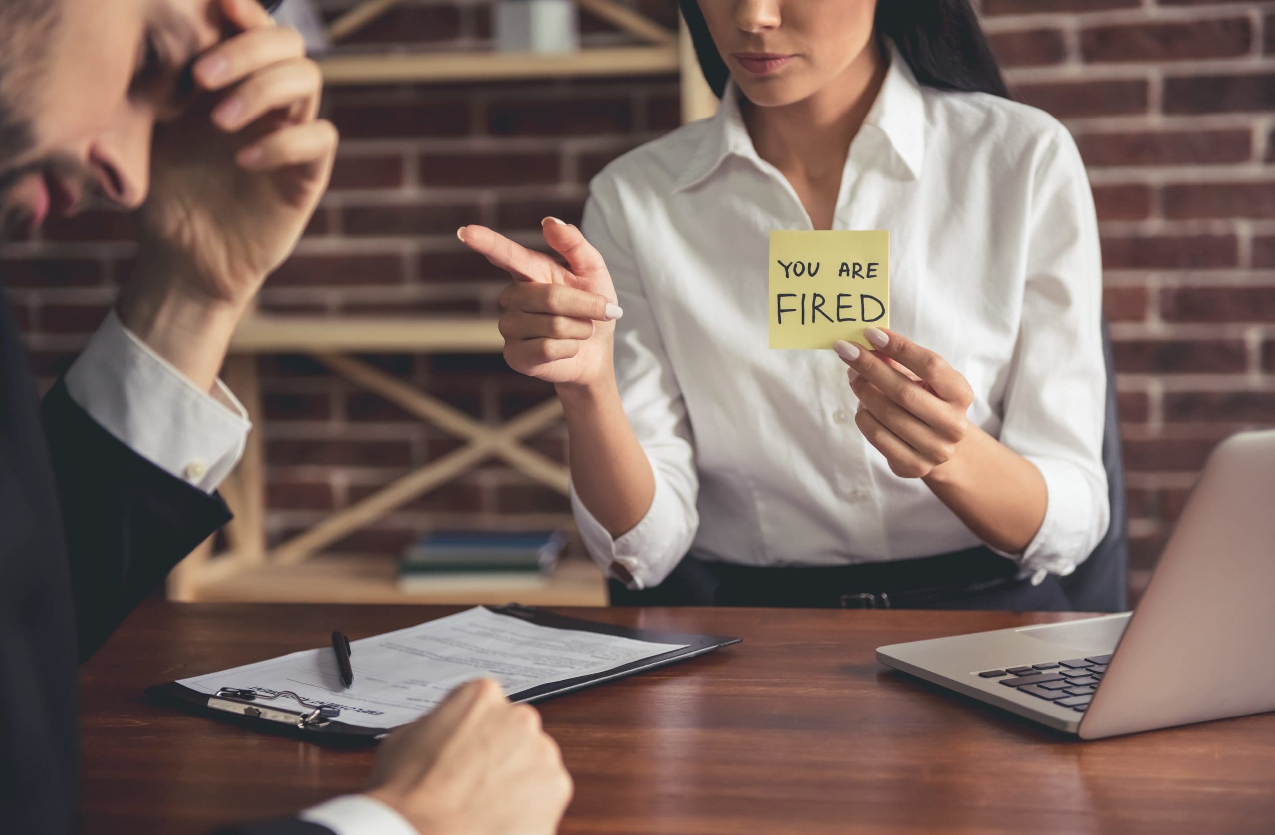 Business person getting fired | RDM Lawyers - Legal Services in